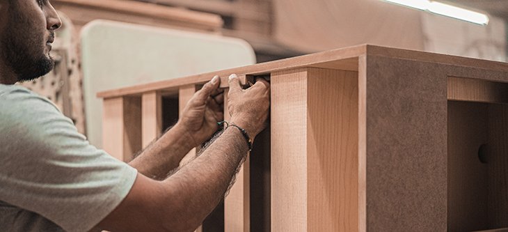 Small business worker detailing wooden furniture -  pexels-cleyder-duque-3637837