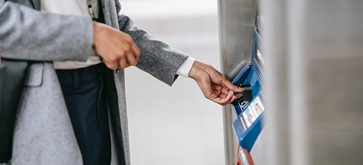 A woman using an ATM. Chase is one of the most popular business checking account solutions for small businesses -  pexels-ono-kosuki-5999933